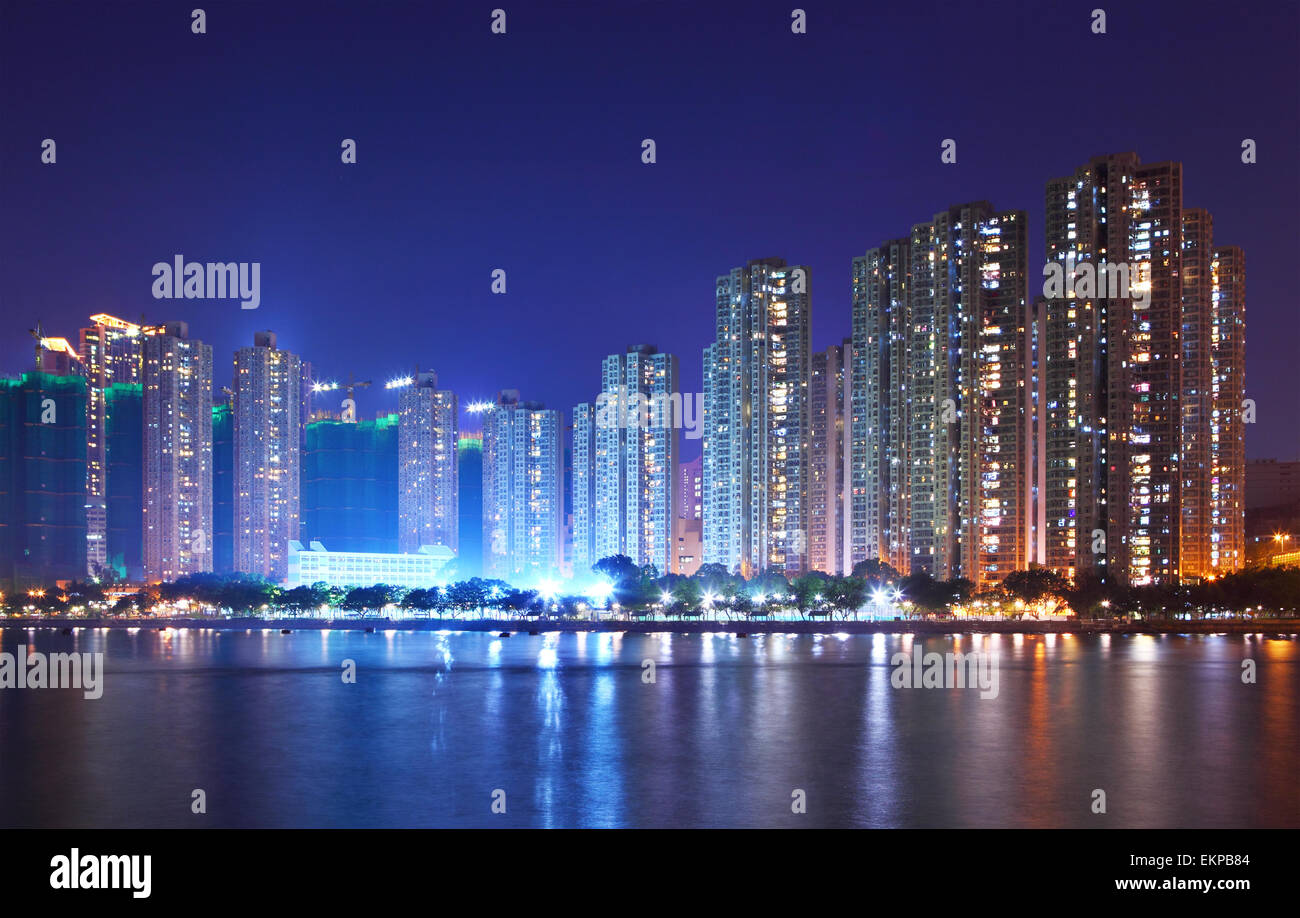 Apartment building in Hong Kong at night Stock Photo - Alamy