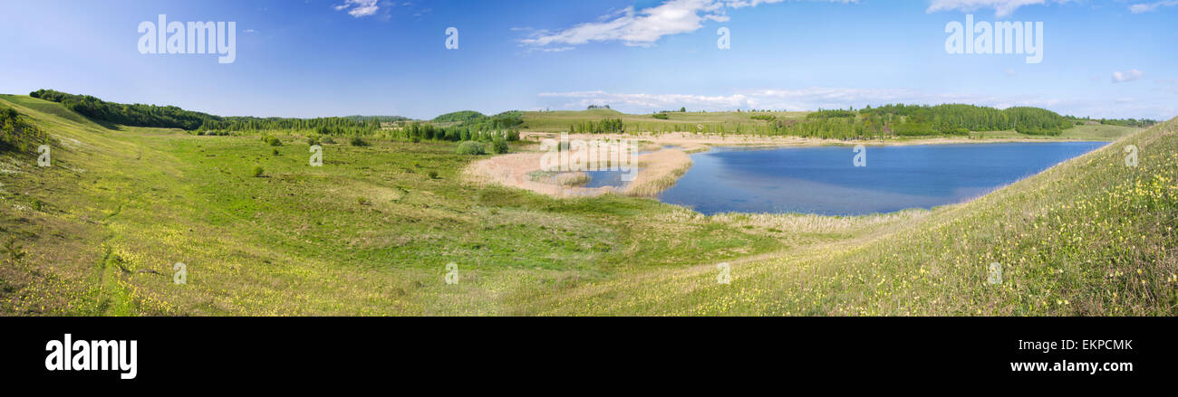 Panorama of beautiful green valley. Izborsk, Pskov region, Russia. Stock Photo