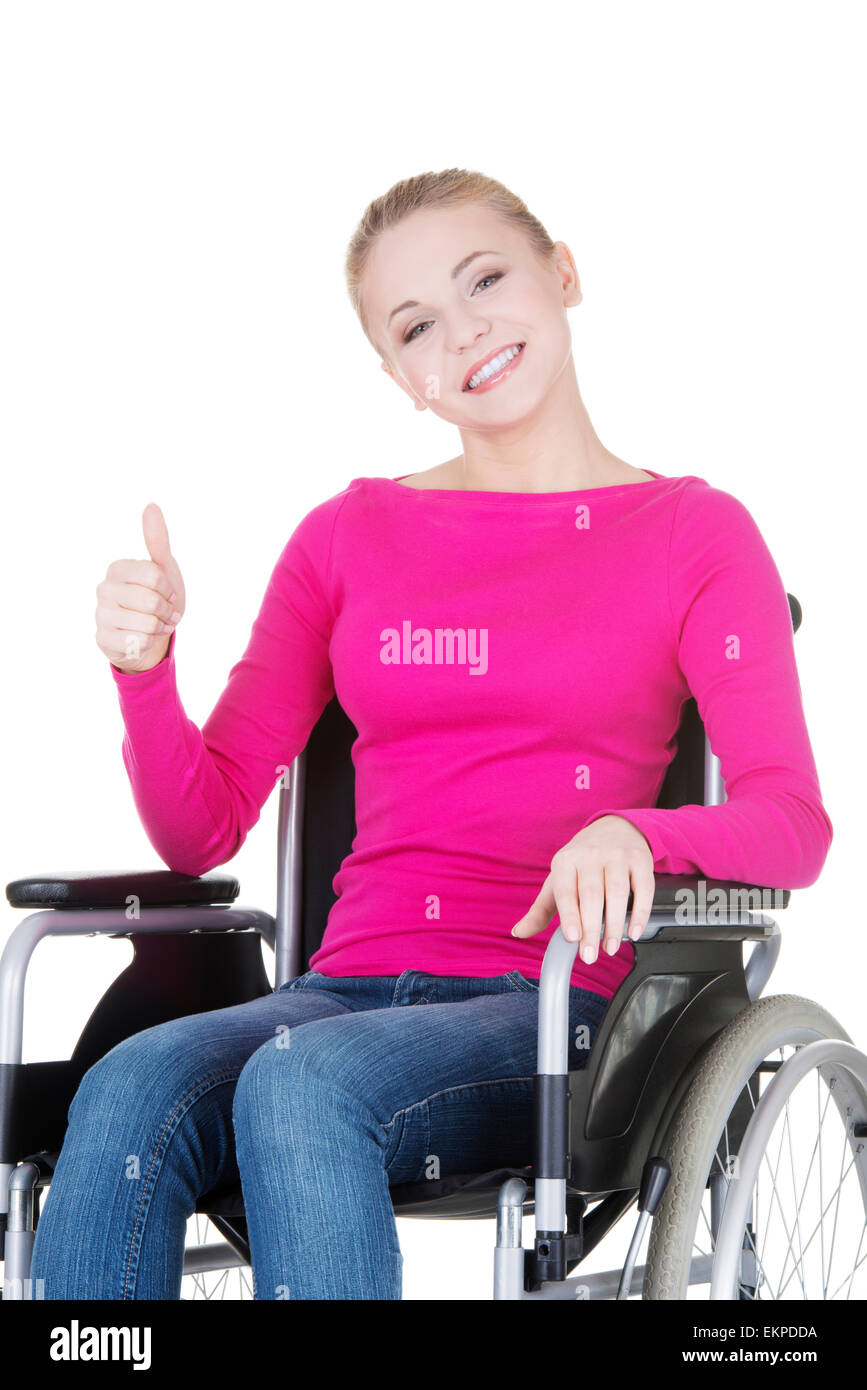 Attractive smiling disabled woman sitting in a wheel chair Stock Photo ...