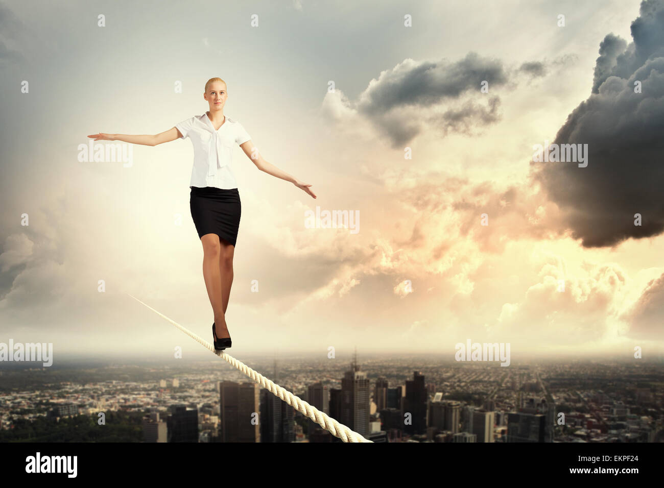 Balance In Rope Woman acrobat balancing on rope hi-res stock photography and images - Alamy