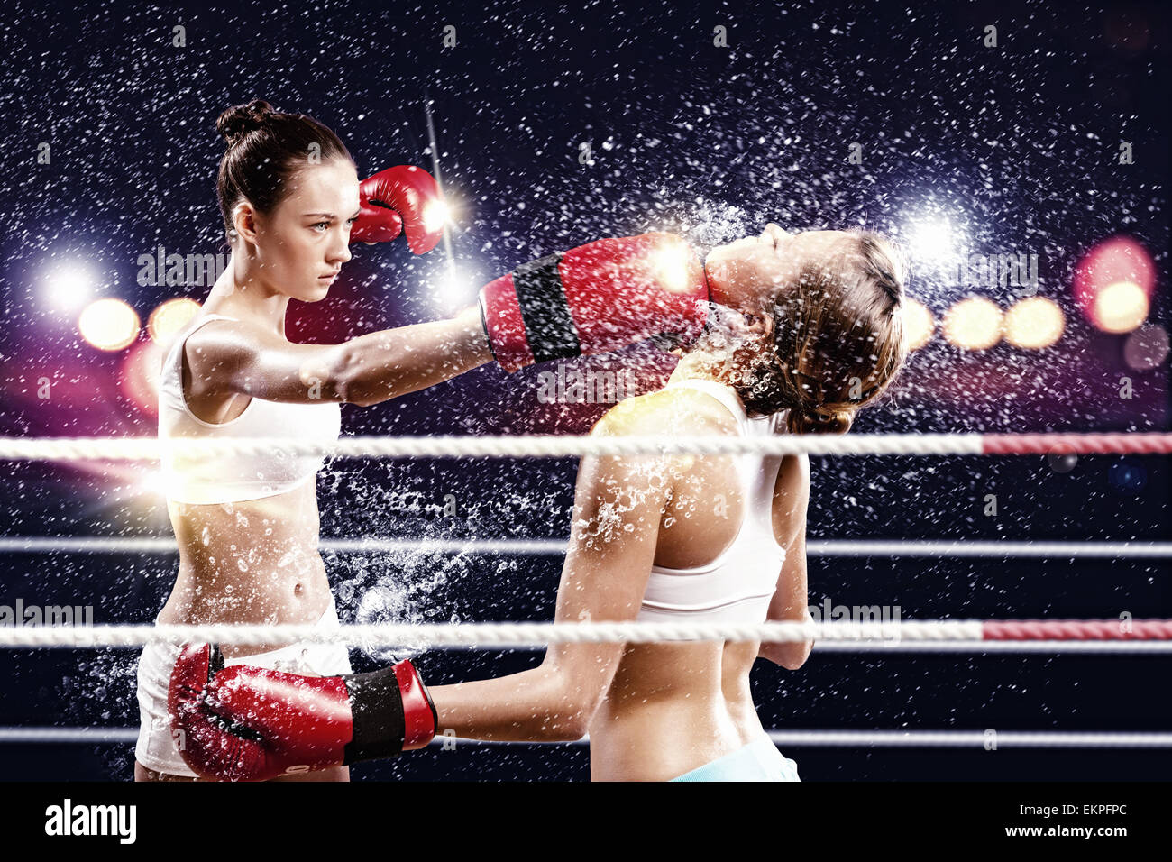 Two women boxing in ring Stock Photo Alamy