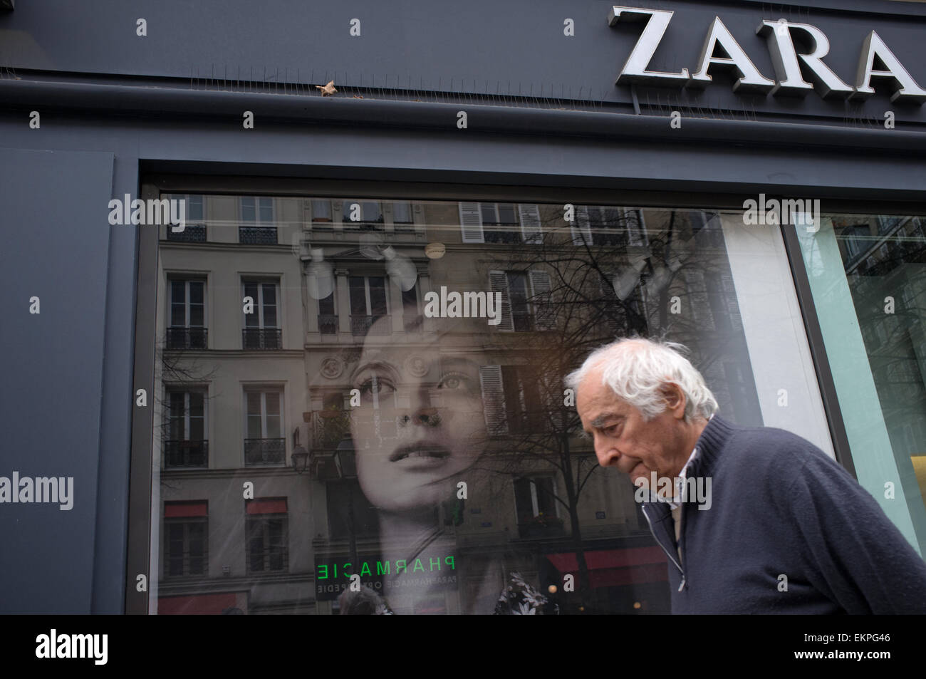 A man walks past a Paris branch of the clothes chain Zara Stock Photo -  Alamy