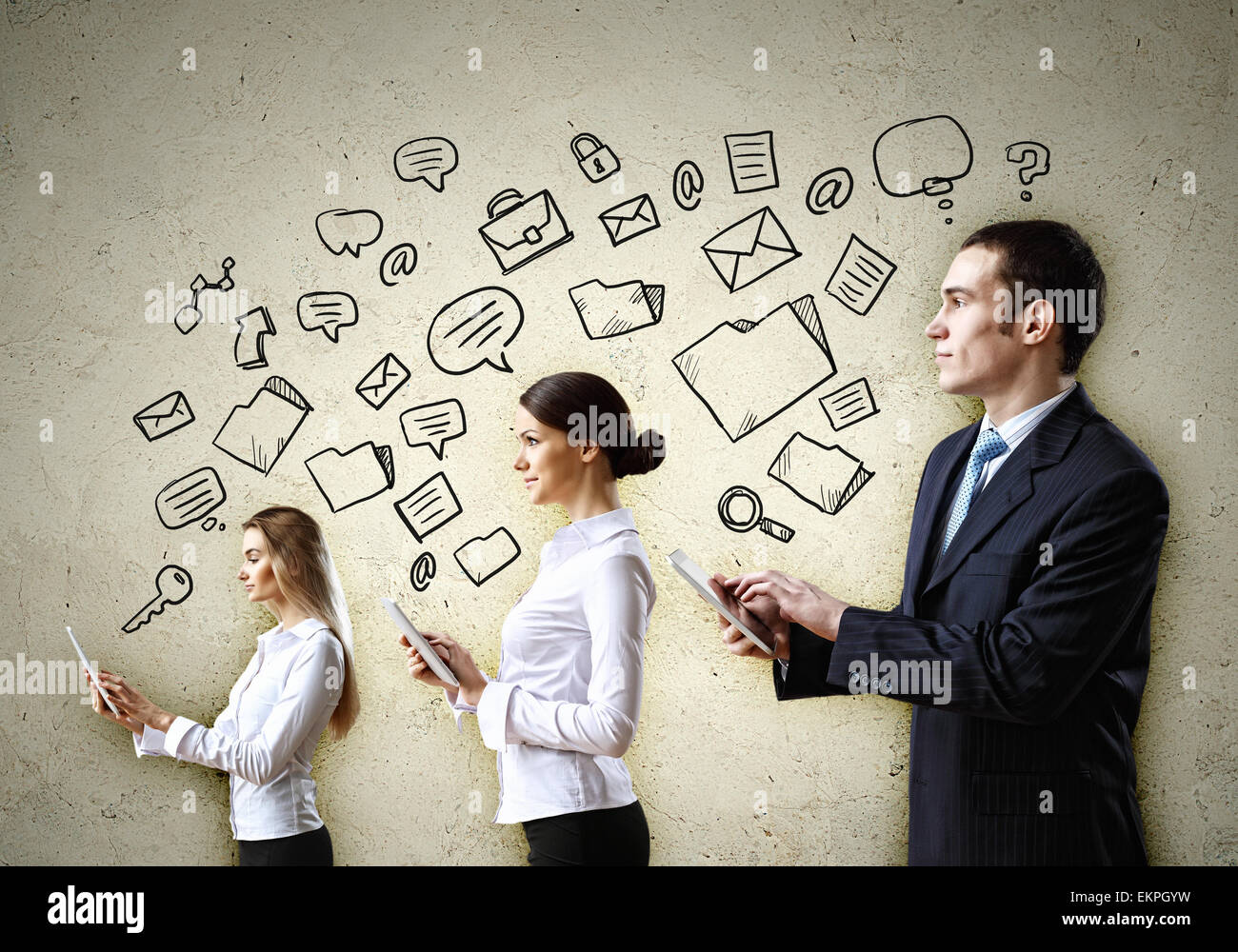 Three young people in business suits Stock Photo - Alamy