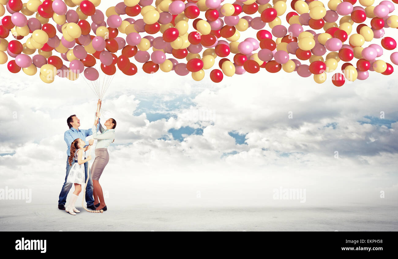 Girl friends holding balloons hi-res stock photography and images - Alamy
