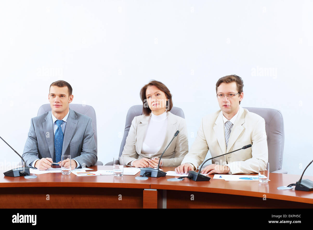 Businesspeople sitting table on hi-res stock photography and images - Alamy