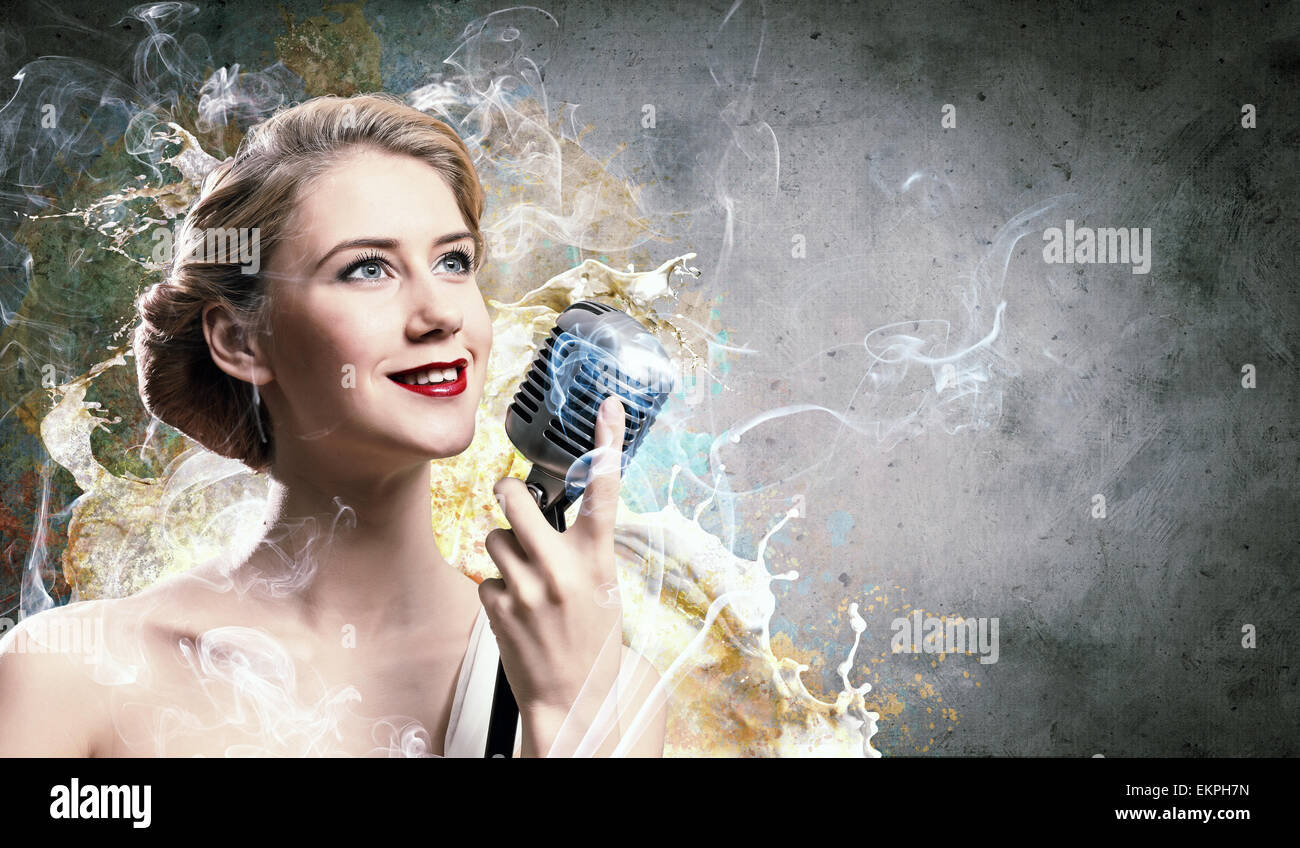 Female blonde singer Stock Photo - Alamy