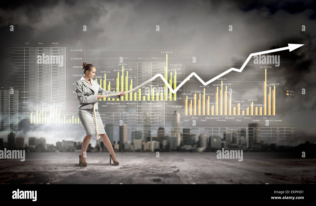 Pulling Graphics Businesswoman pulling graphic Stock Photo - Alamy