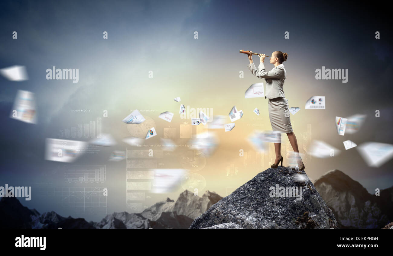 Business woman with telescope Stock Photo - Alamy