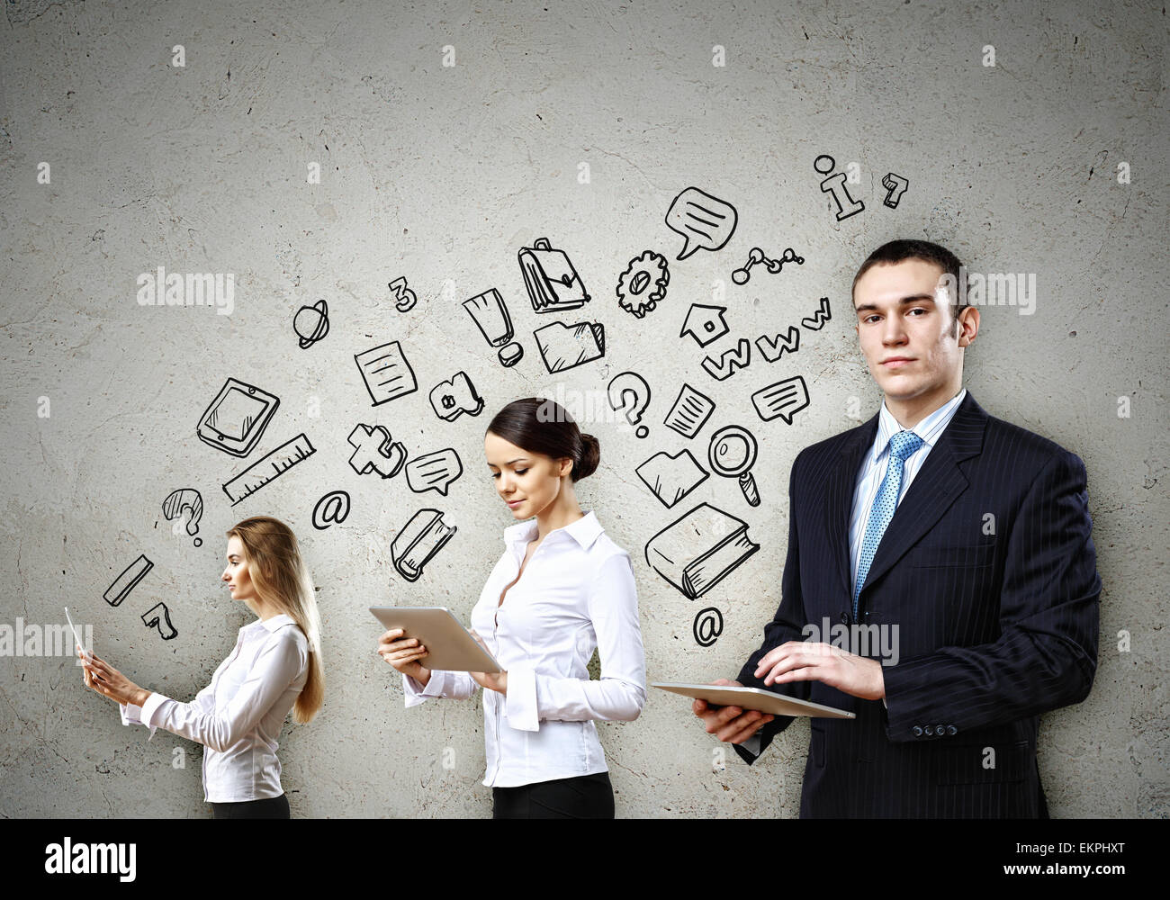 Three young people in business suits Stock Photo - Alamy