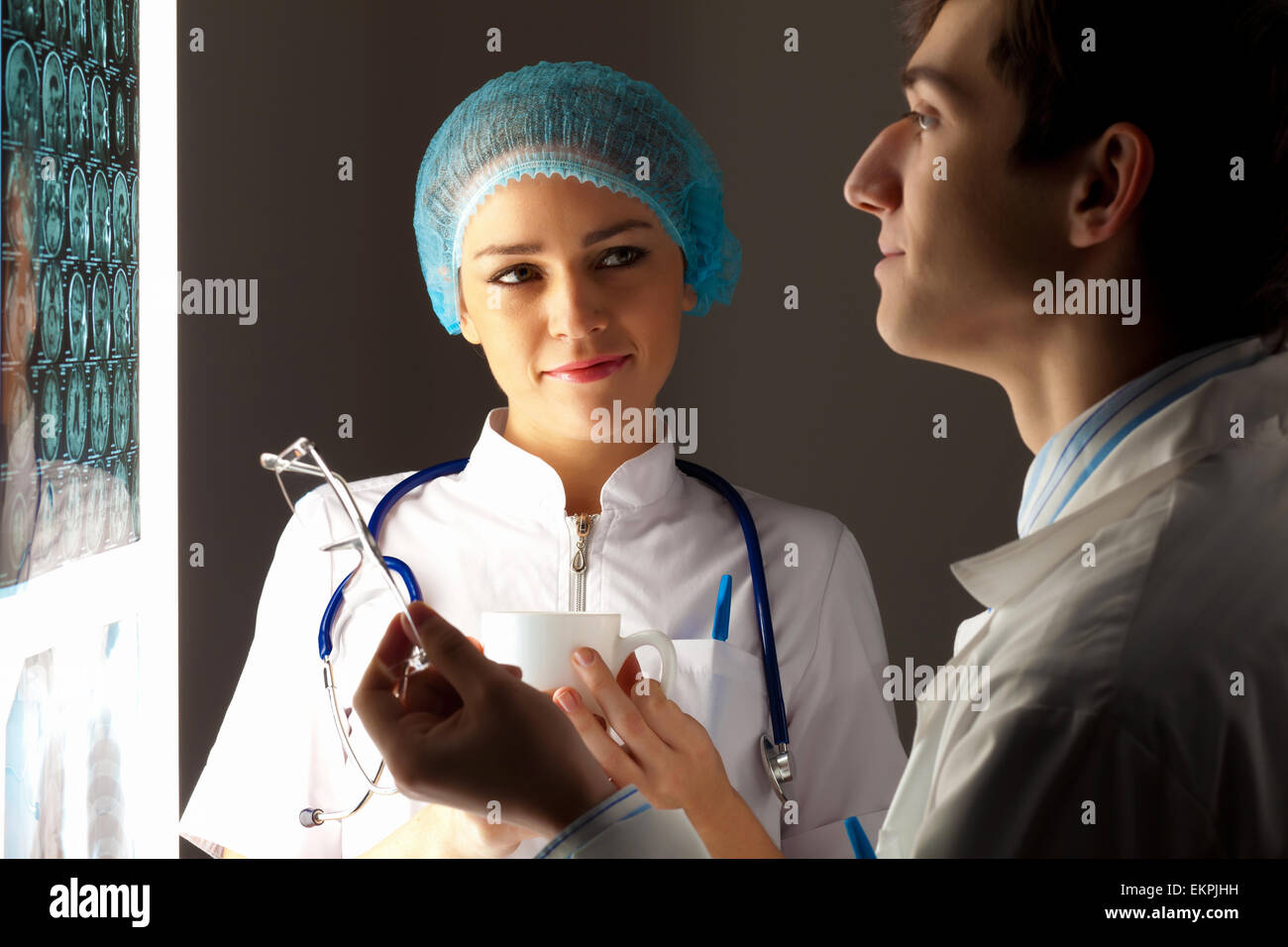 Two Doctors Examining X-ray Results Stock Photo - Alamy