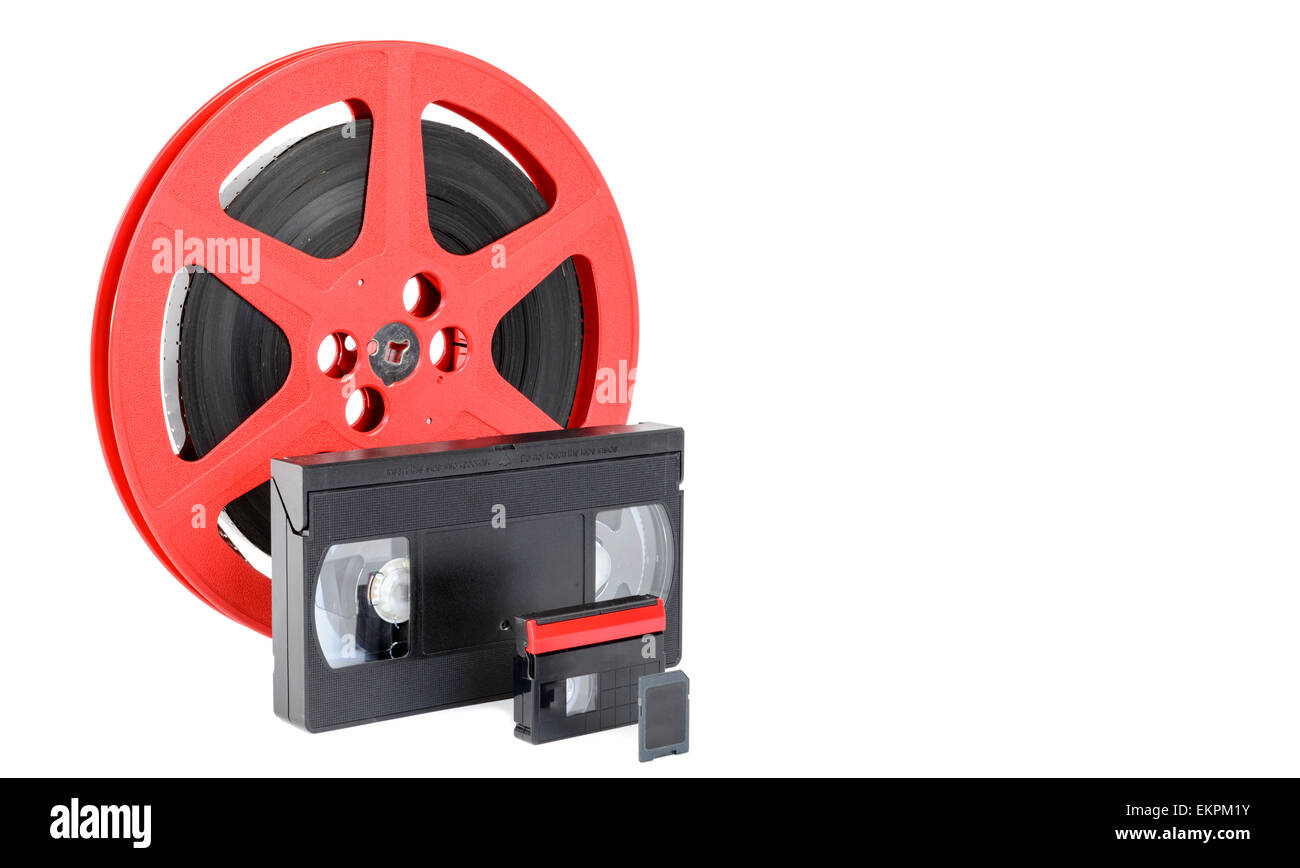 old reel of film, video tape and memory card on white Stock Photo