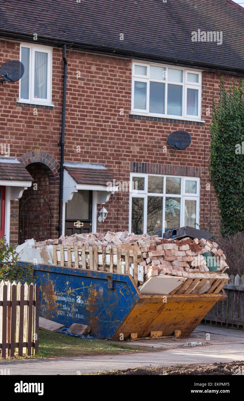 Overloaded skip, England ,UK Stock Photo Alamy
