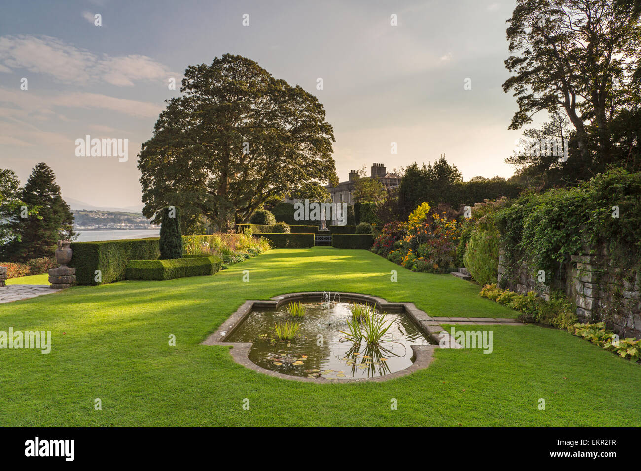 Evening light over Plas Newydd Country House and Gardens, Anglesey, Wales. UK Stock Photo