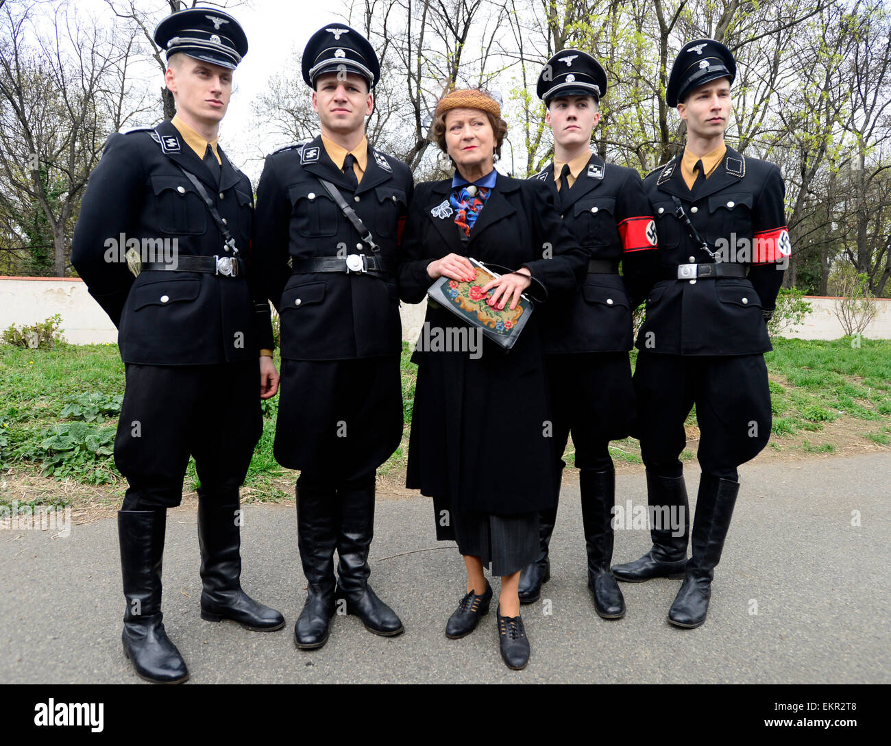 Shooting of the film about Czechoslovak film star Lida Baarova starts in the Olsany cemetary, Prague, Czech Republic, April 13, 2015. Pictured centre Simona Stasova. The lead role in the prepared Czech film about actress Baarova, who was mistress of Nazi Germany´s Propaganda Minister Joseph Goebbels before the war, will play Slovak actress Tana Pauhofova. Stock Photo