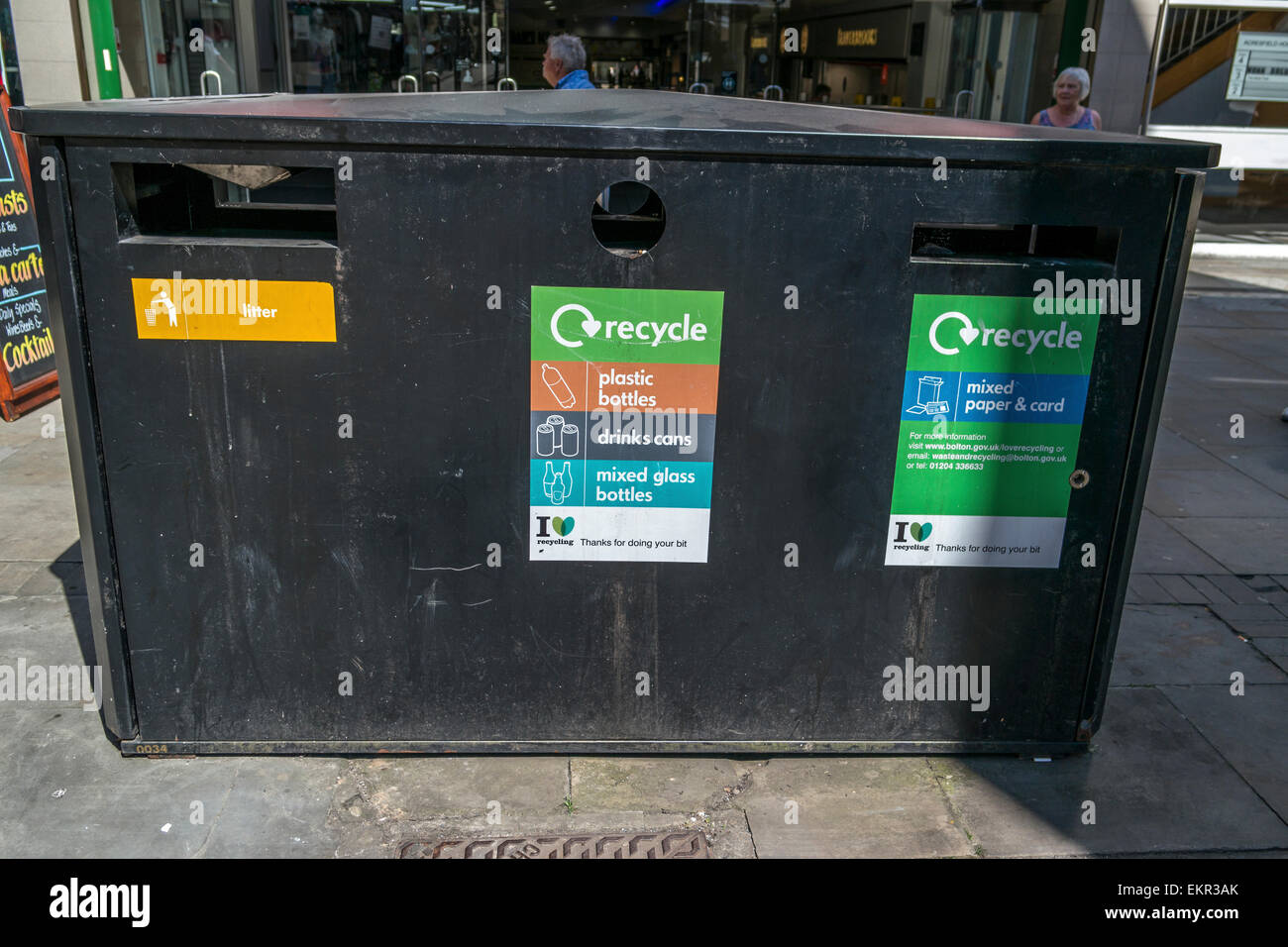 Black recycle bins or trash cans in the town centre Stock Photo Alamy
