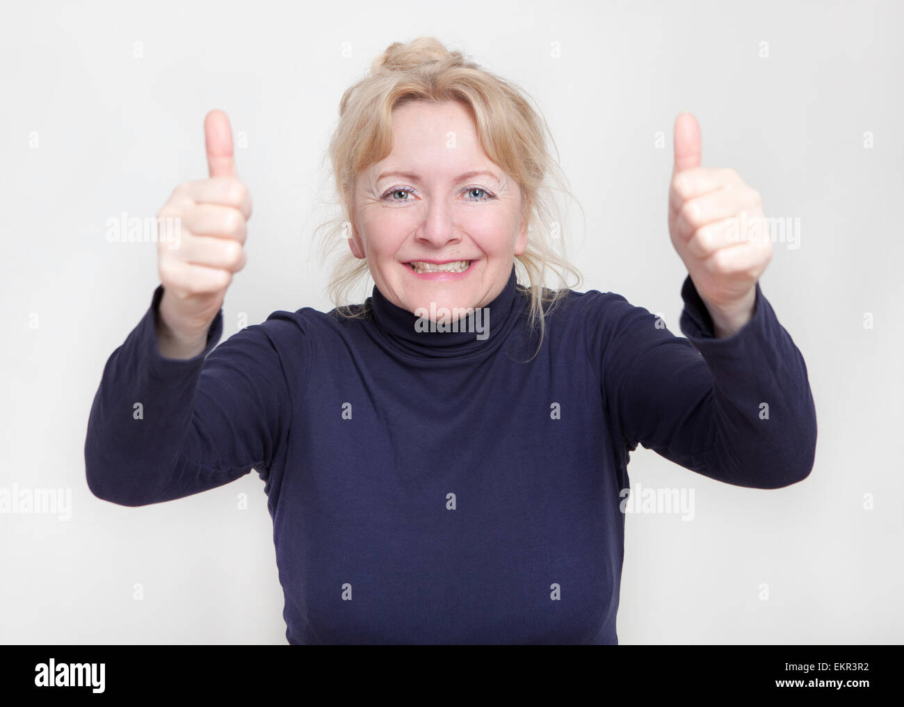 Happy thumbs up female hi-res stock photography and images - Alamy