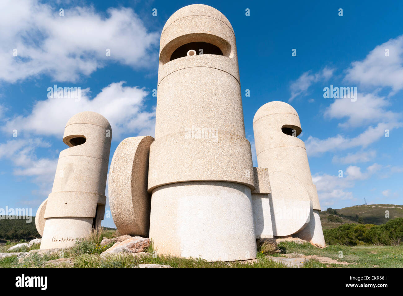 The Cathar Knights is a cement sculpture by Jacques Tissinier above the A61 autoroute at the Aire De Peche Loubat service area. Stock Photo