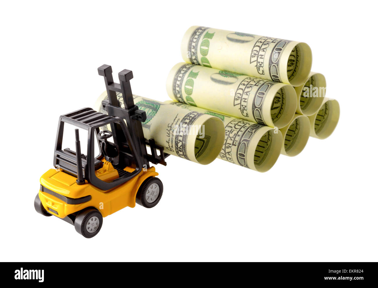Isolated objects: financial concept, yellow forklift stacking up one-hundred dollar bills, rolled as tubes, isolated on white ba Stock Photo