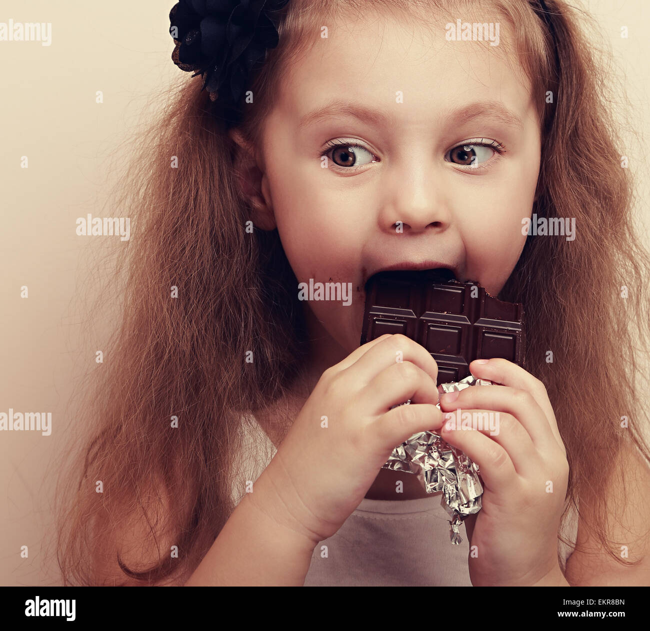 Vintage kid eating candy hires stock photography and images Alamy