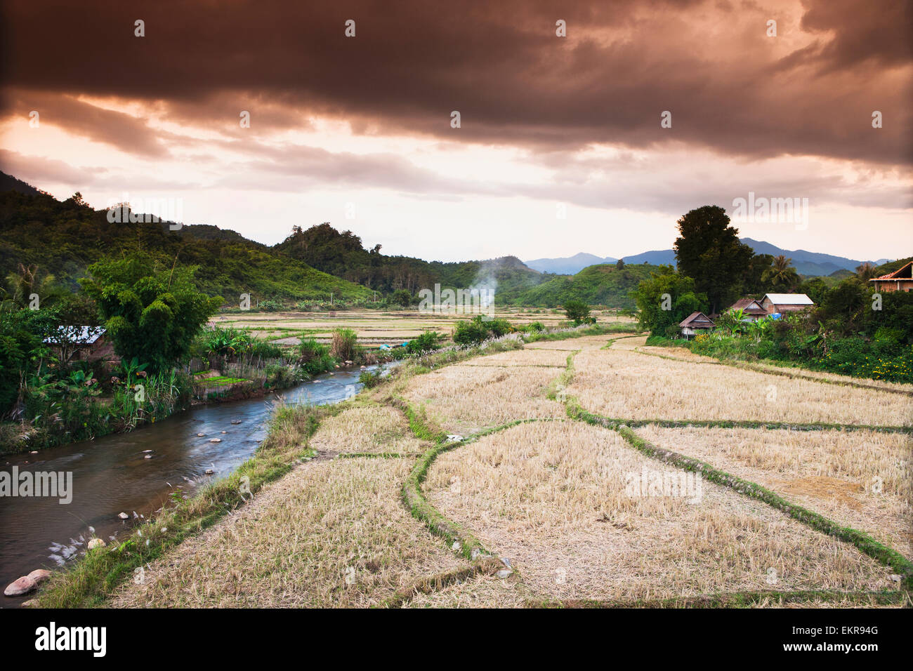 Landscape and storm clouds over a remote Northern Laos village; Vieng Thong; Laos Stock Photo