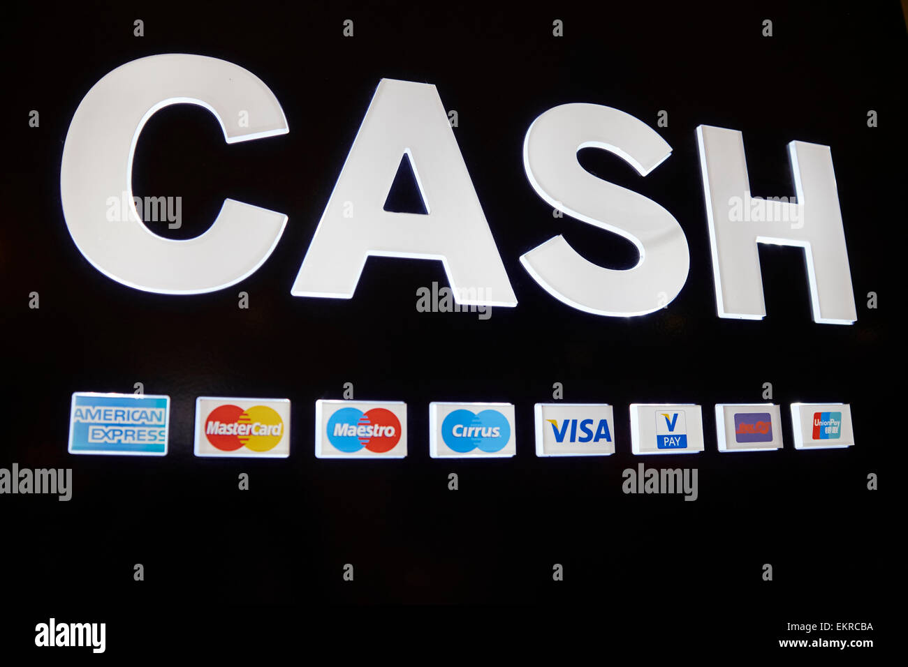 Cash Sign Above An ATM With The Logos Of Major Credit Cards Birmingham Airport UK Stock Photo