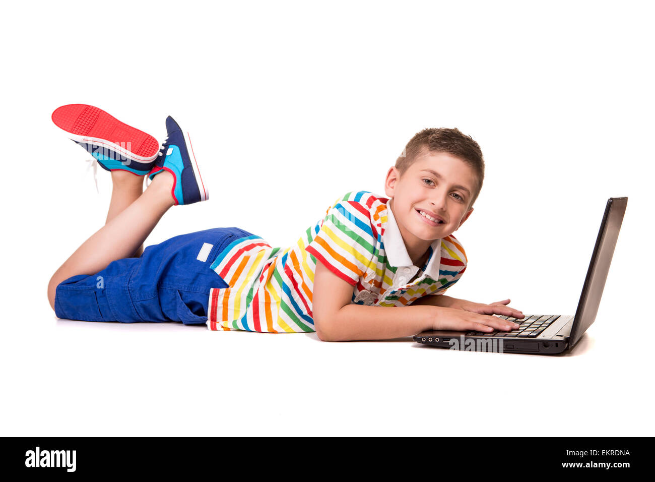 Cute blond boy using a personal computer Stock Photo - Alamy