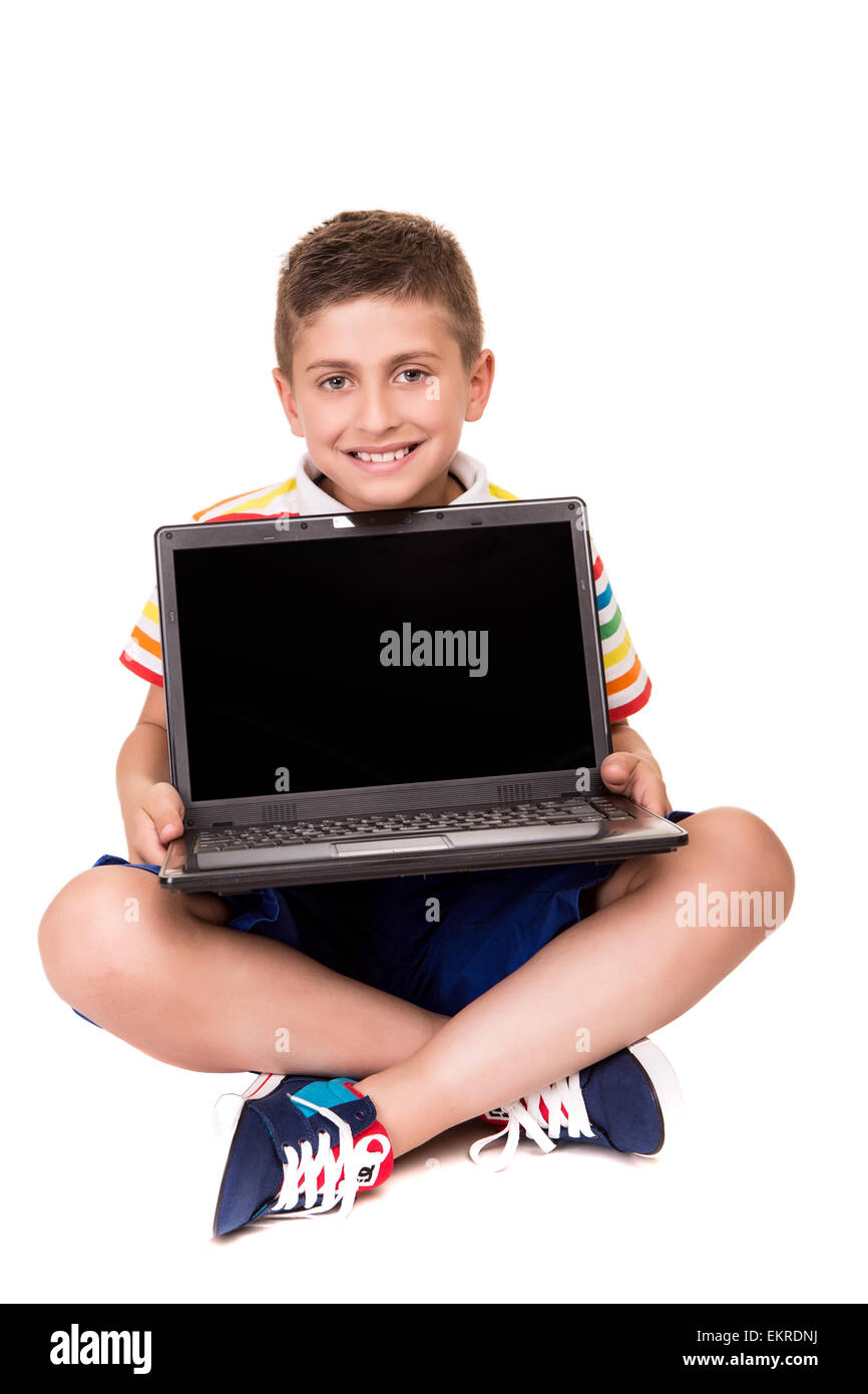 Cute blond boy using a personal computer Stock Photo - Alamy