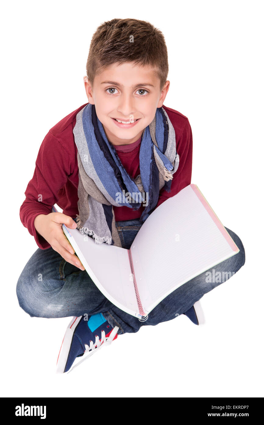 Young boy holding a sketchbook over white background Stock Photo - Alamy