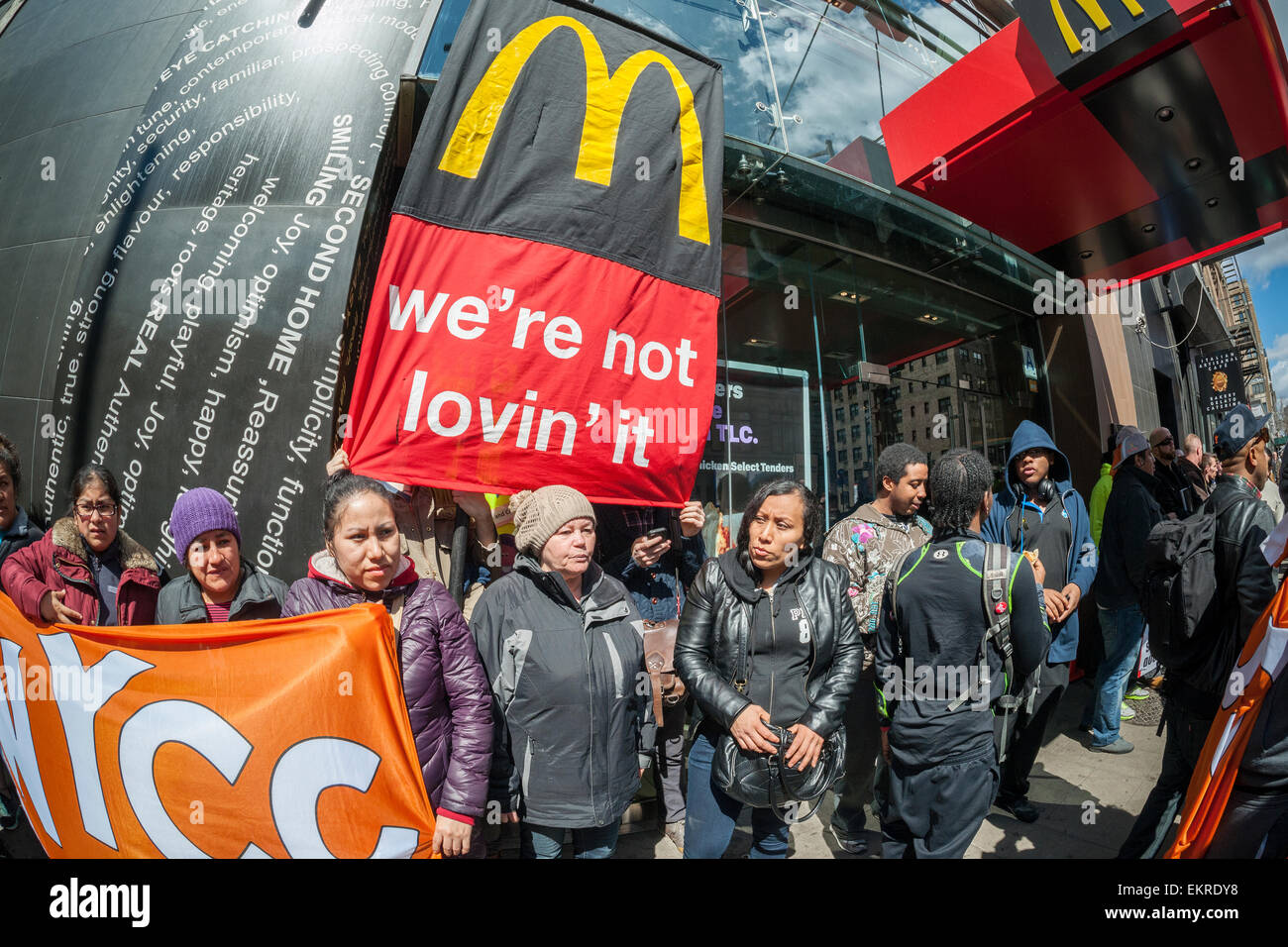 Construction workers join fast food workers at a protest in front of a