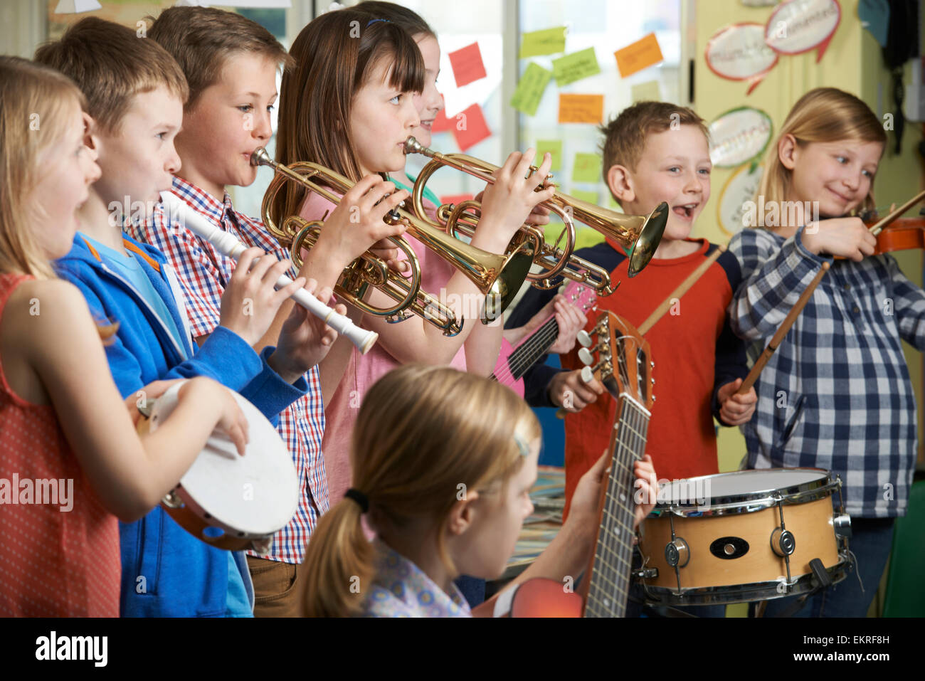 Group Of Students Playing In School Orchestra Together Stock Photo