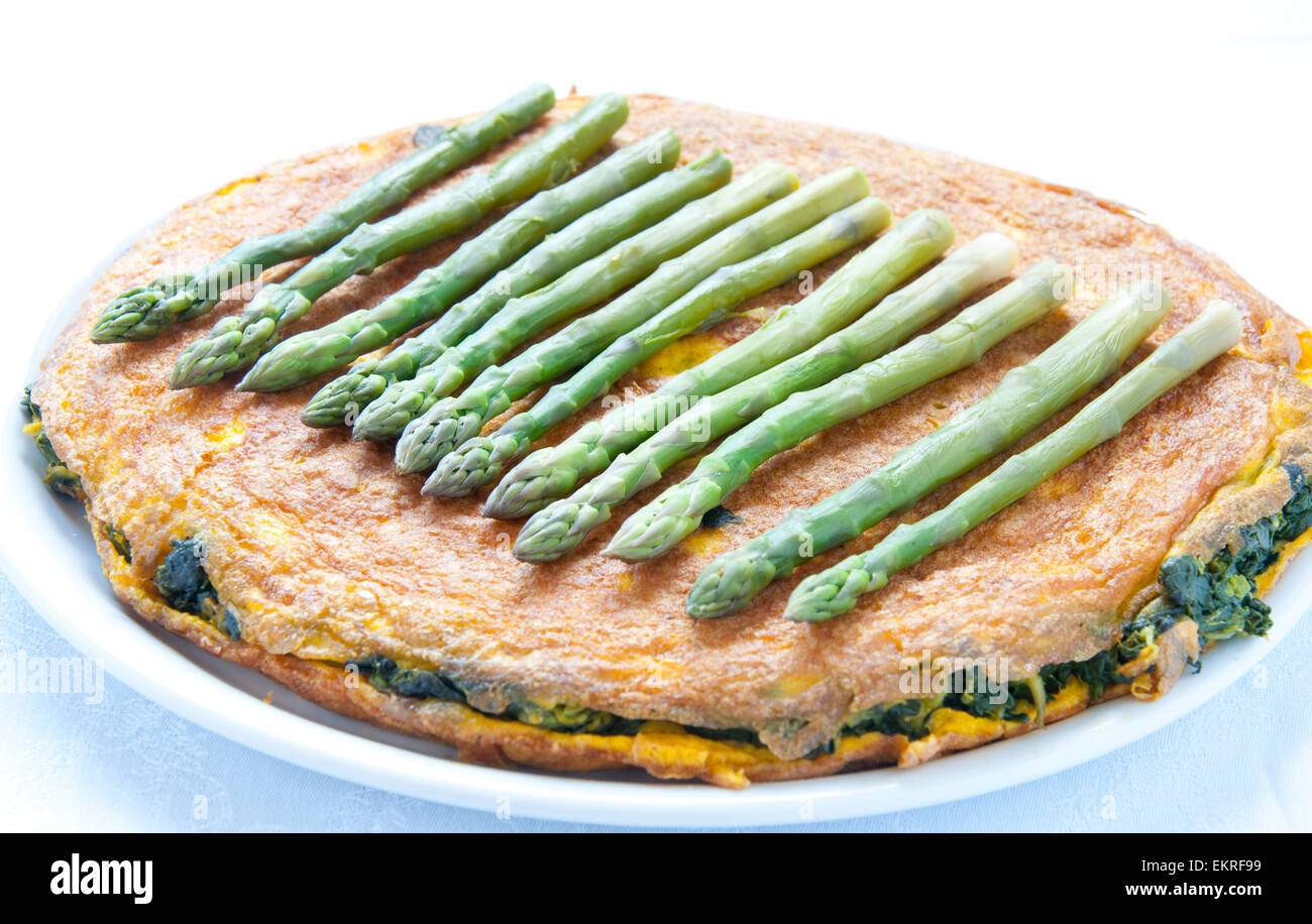 Egg omelet with spinach and asparagus Stock Photo Alamy