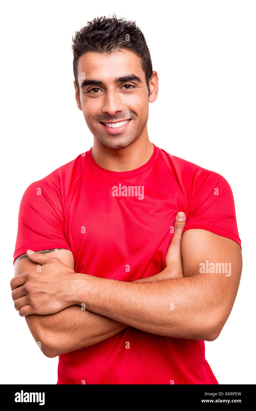Man with arms crossed over white background Stock Photo Alamy