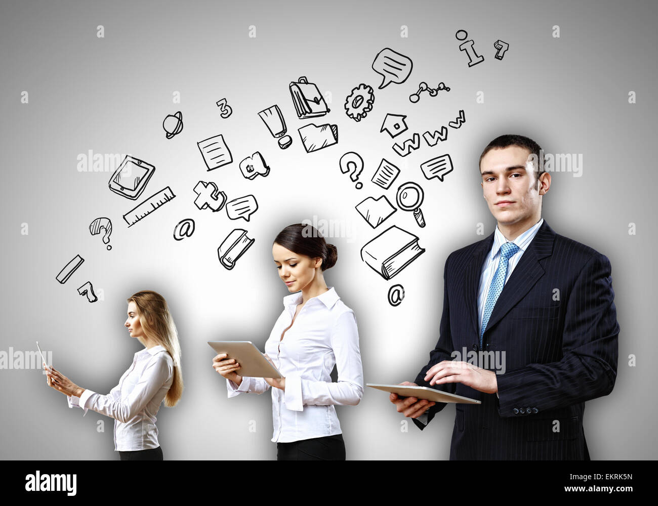 Three young people in business suits Stock Photo - Alamy