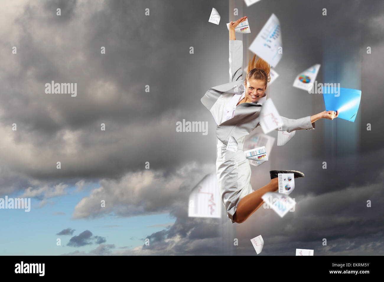 Image of running businesswoman Stock Photo - Alamy