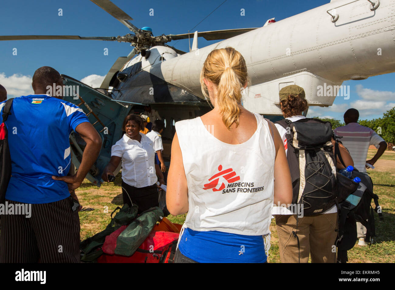 In mid January 2015, a three day period of excessive rain brought unprecedented floods to the small poor African country of Malawi. It displaced nearly quarter of a million people, devastated 64,000 hectares of land, and killed several hundred people. This shot shows A Russian Mi8 helicopter being used by the United Nations, World Food Program to deliver food aid and Medicin Sans Frontieres docotrs to areas still cut off by the flooding, around Bangula and Mkhanga. Stock Photo
