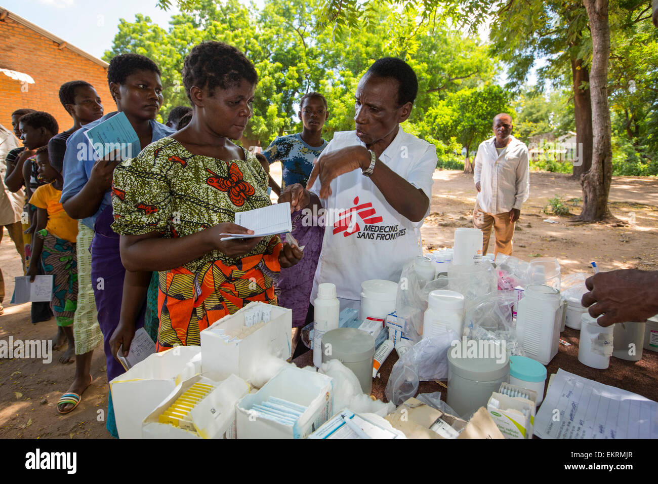 January 2015 saw a three day period of excessive rain which brought unprecedented floods to the small poor African country of Malawi. It displaced nearly quarter of a million people, devastated 64,000 hectares of land, and killed several hundred people. This shot shows A Medicin Sans Frontieres clinic in Makhanga providing Malaria treatment drugs to local people, many of whom now have malaria, as a result of the drying up flood waters providing ideal breeding grounds for mosquitoes. Stock Photo