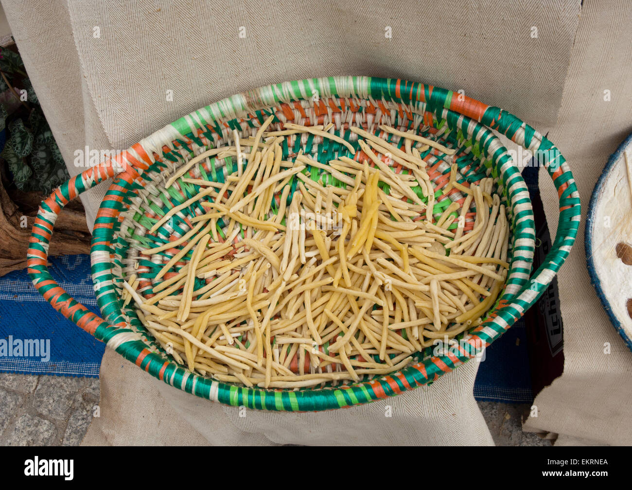 Lula,Sardinia,Italy, 10/2012. Home made fresh Macarrones pasta, ready to cook, in a traditional Sardinian basket Stock Photo