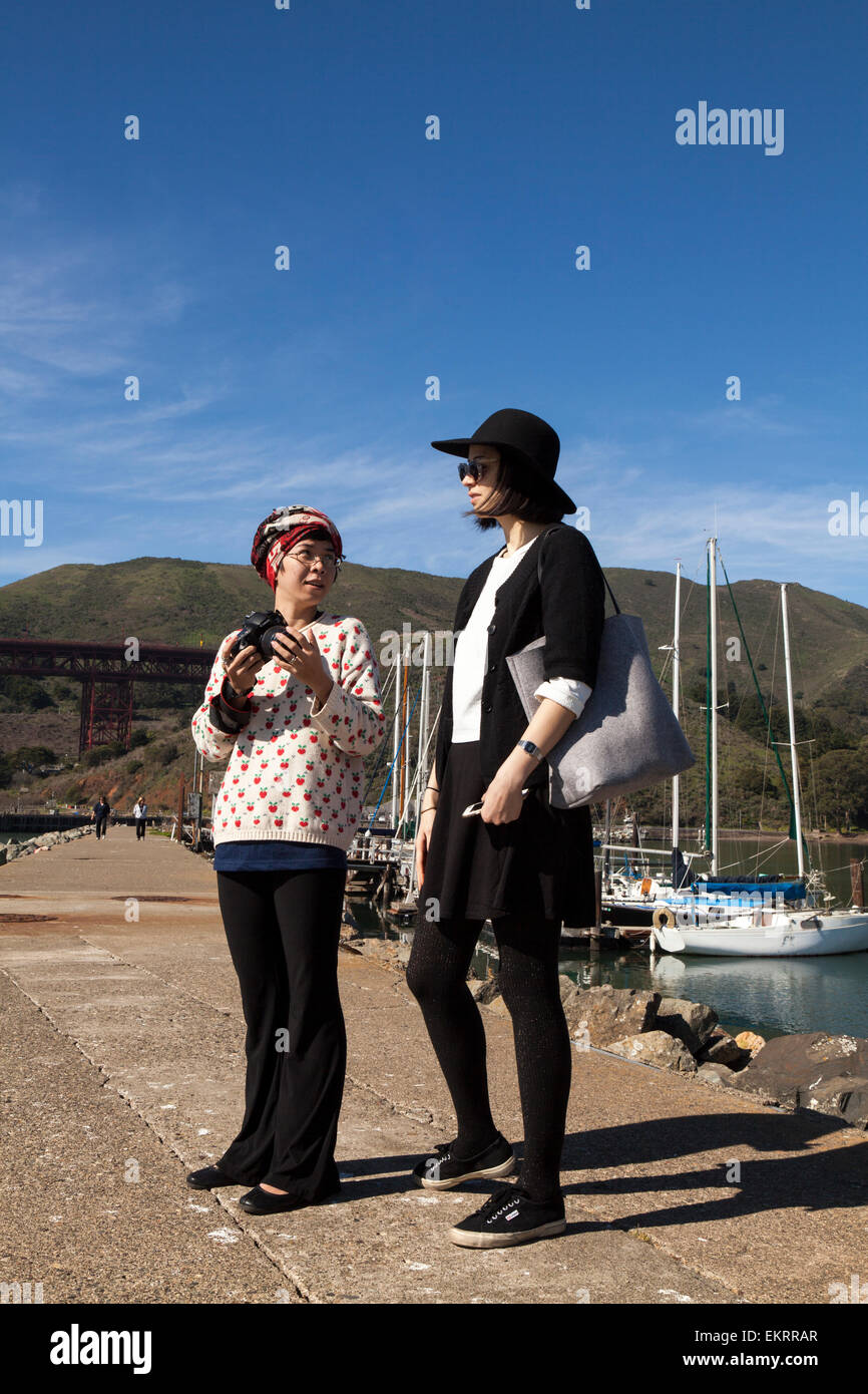 Tourists at Horseshoe Bay Marina by the Golden Gate Bridge, Sausalito, California, USA Stock Photo