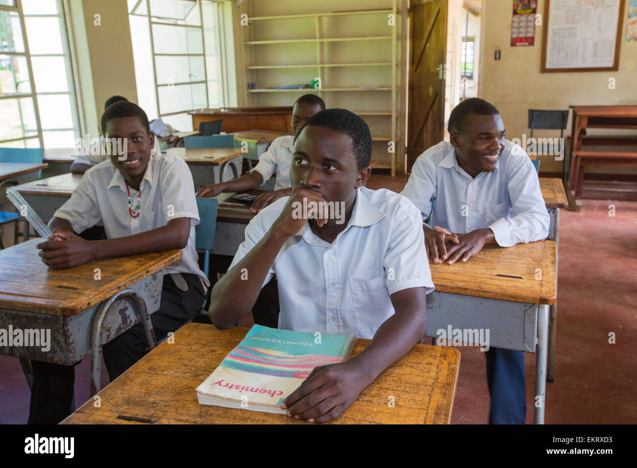 Pupils in a classroom at Nankhunda seminary school, which provides a catholic education for boys from the local community, on the Zomba Plateau, Malawi. Stock Photo