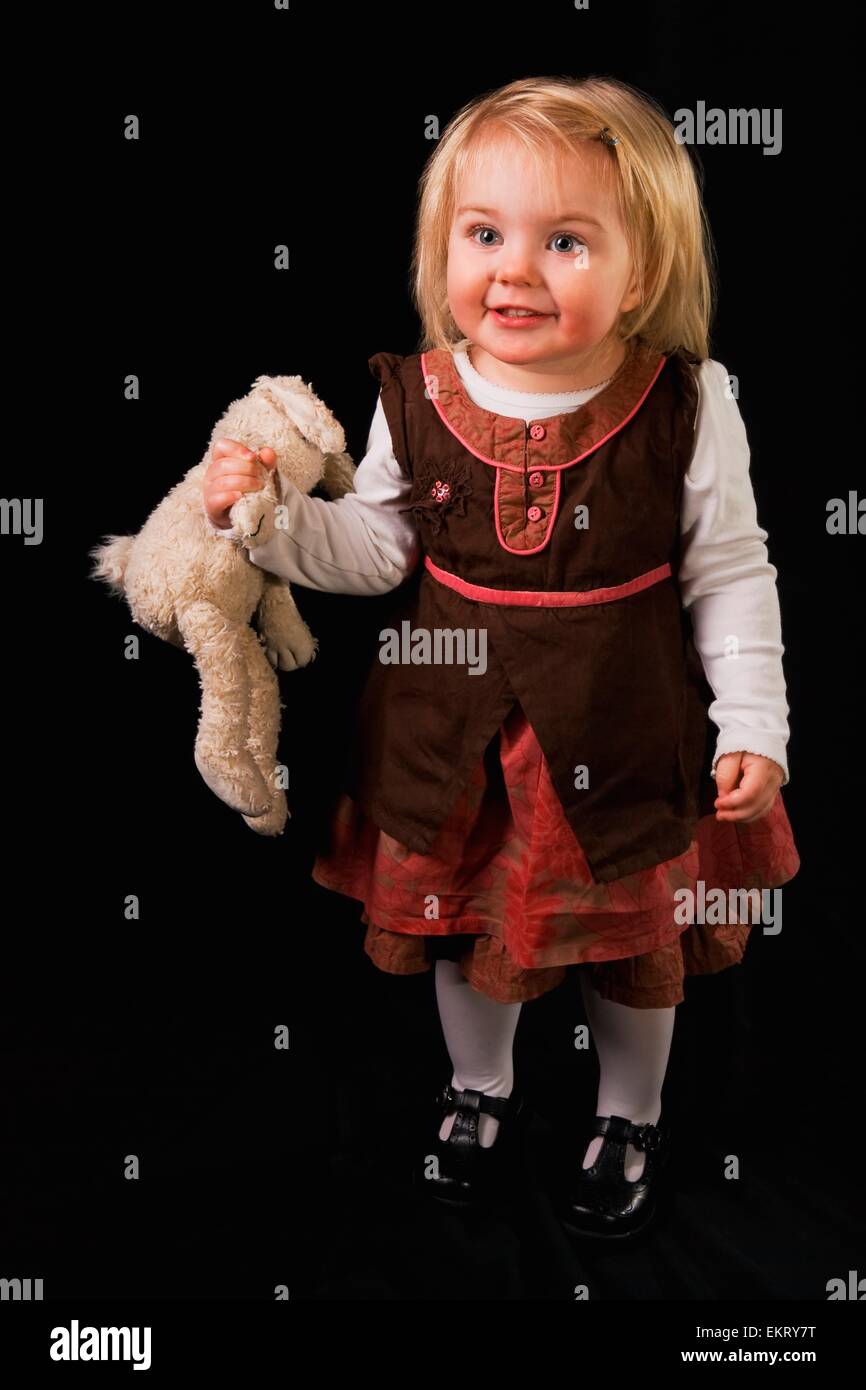 A Young Girl With Her Stuffed Toy Stock Photo - Alamy