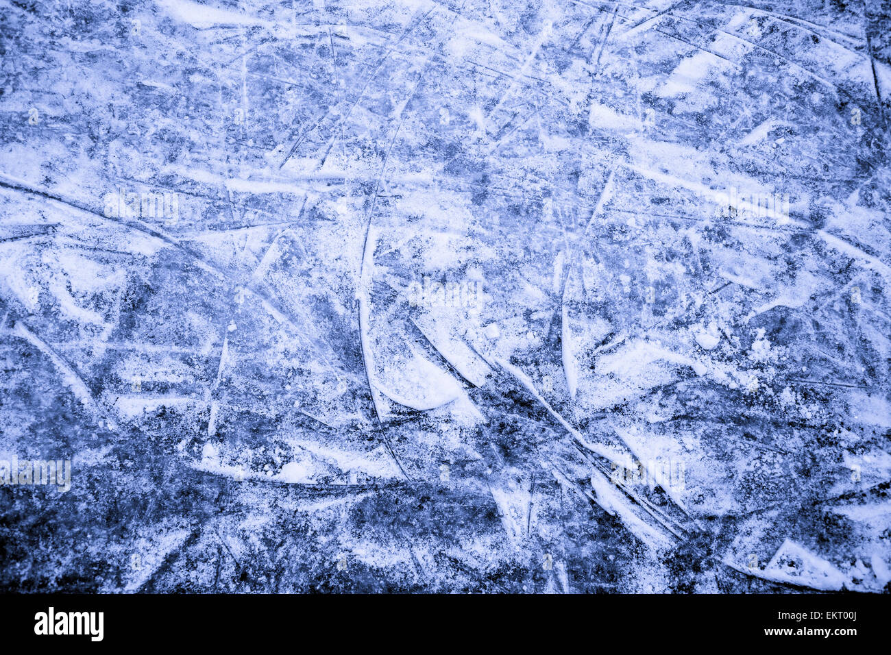 A close up shot of an ice rink, with all the skate marks. Stock Photo