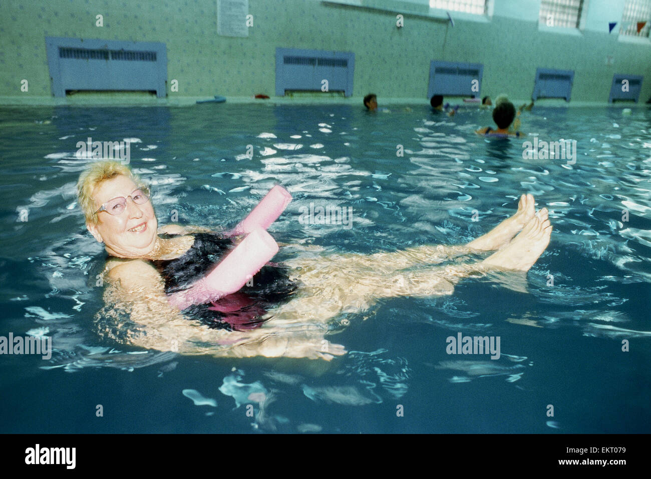 Senior Women Floating In Pool Stock Photo Alamy