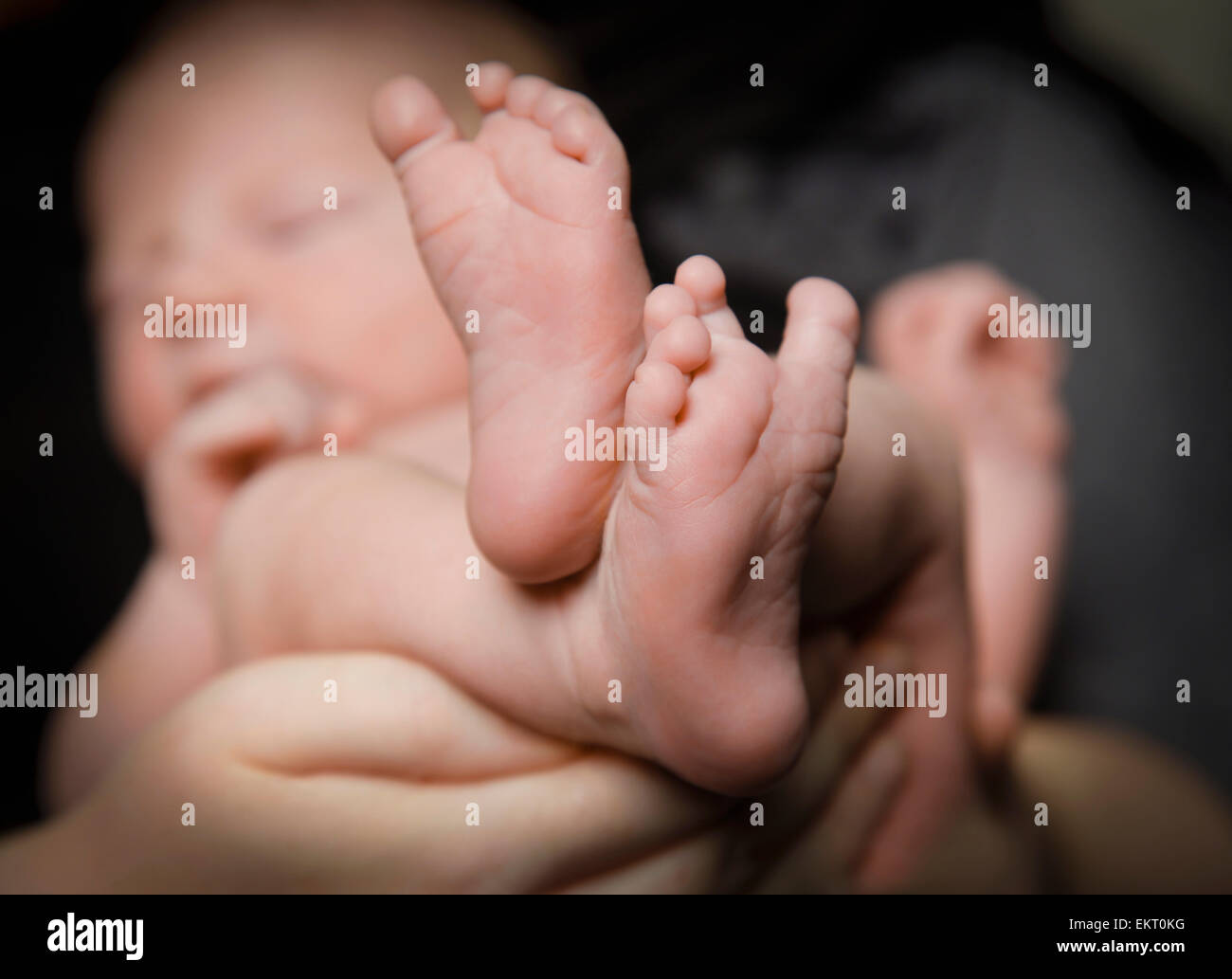 baby foot on face