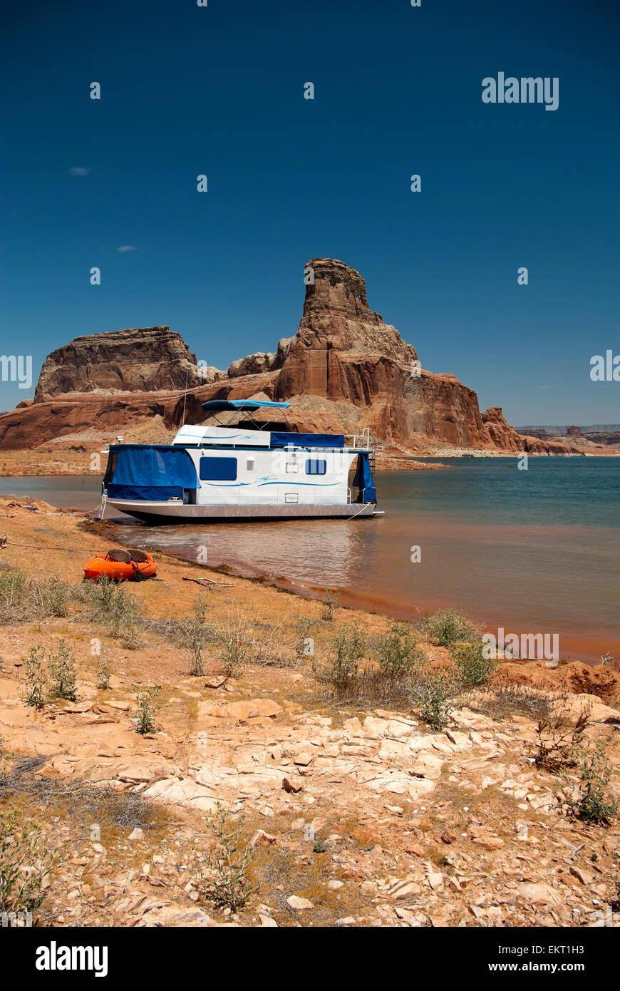 Houseboat Moored On Lake Powell With Kayak; Page Arizona Usa Stock