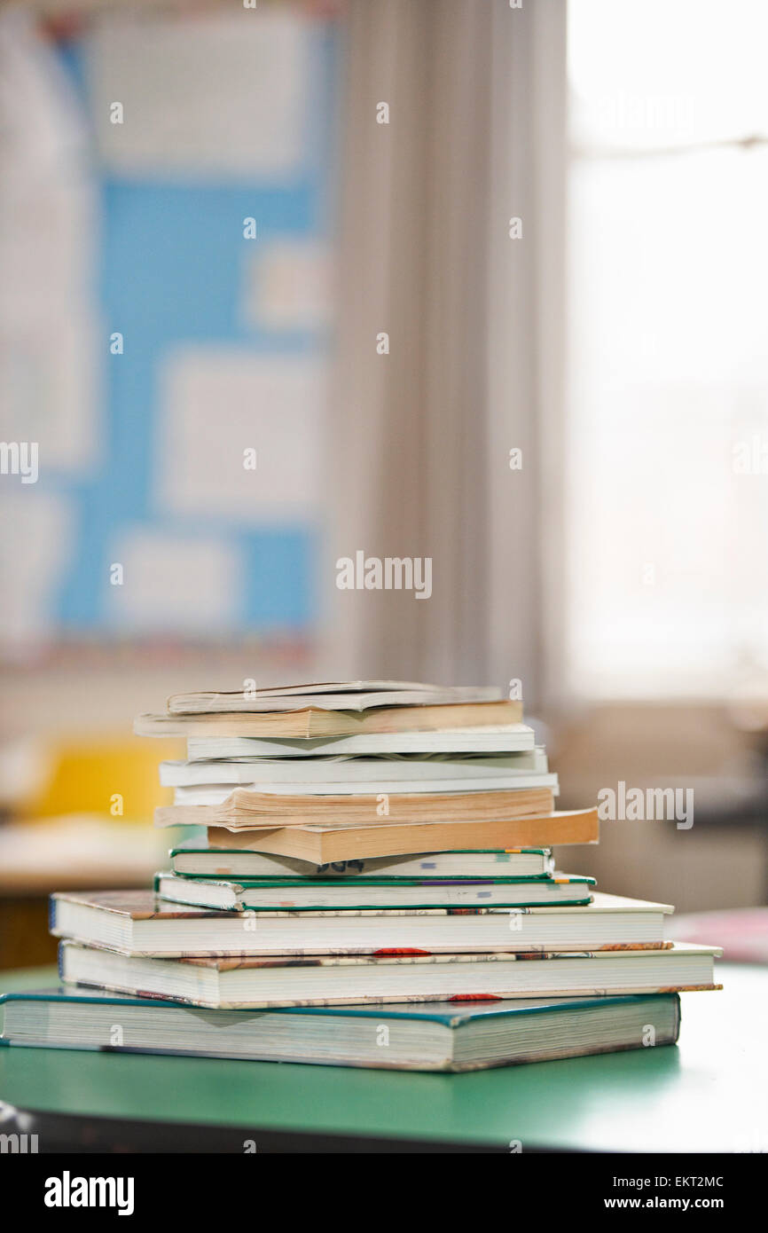 Stack Of Schoolbooks In A Classroom, Toronto, Ontario, Canada Stock Photo