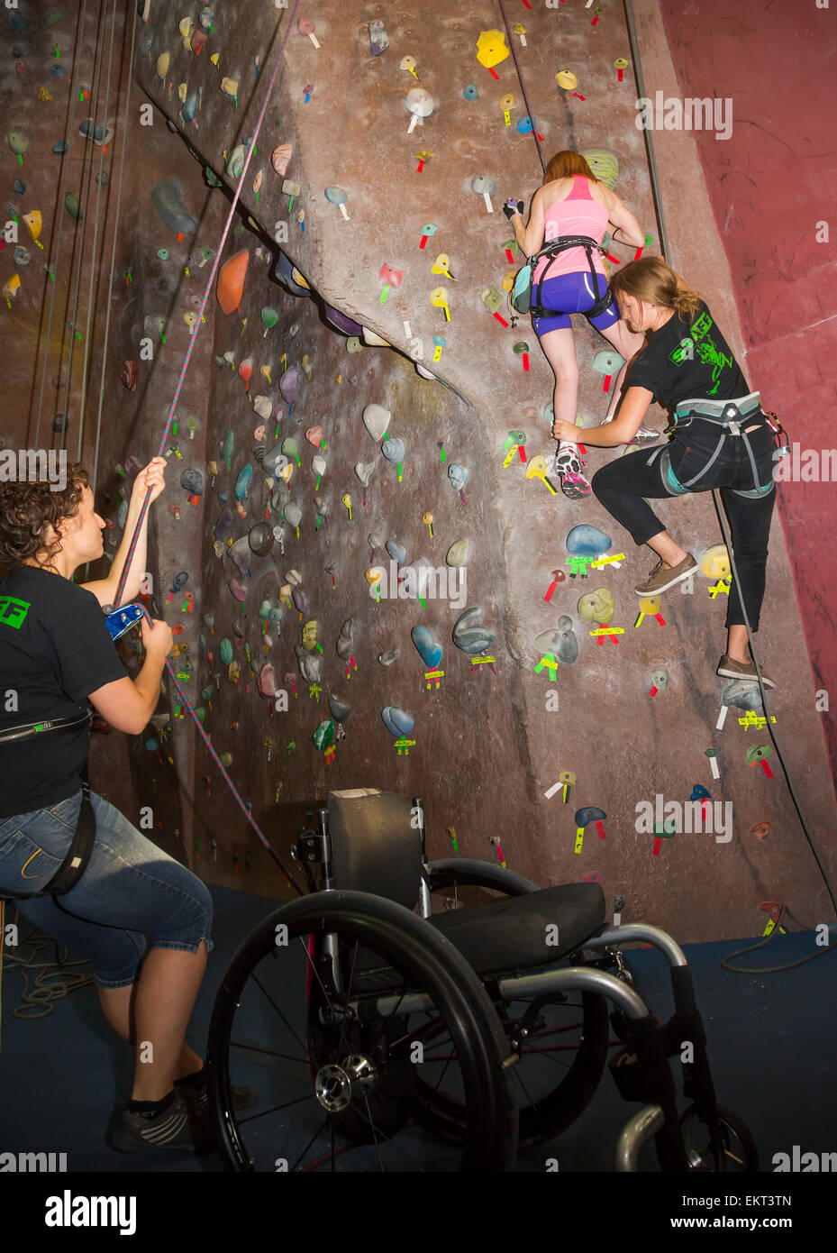 Woman with spinal cord injury rock climbing; Edmonton, Alberta, Canada