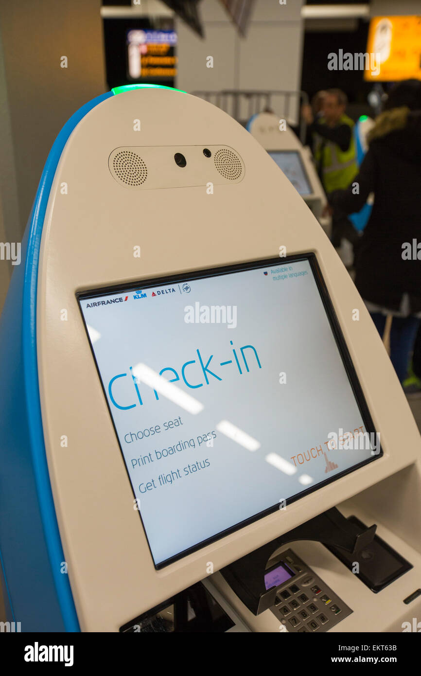 Automated check in machines in Schiphol airport in Amsterdam, Holland. Stock Photo
