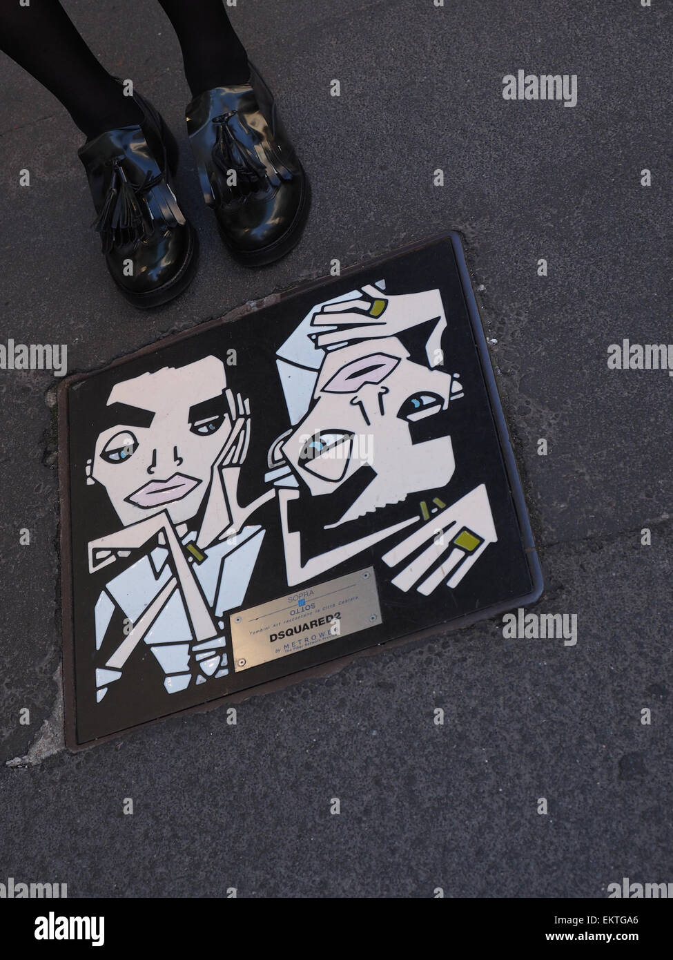 Manholes paintings in Montenapoleone street, Milan, Lombardy, Italy, Europe Stock Photo