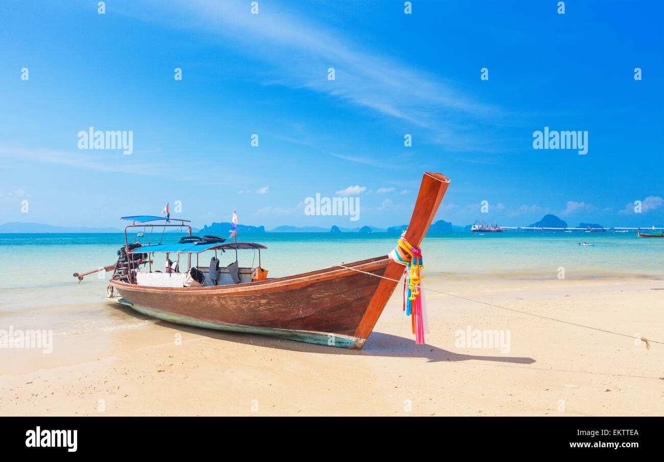 Long tail boat on tropical beach, Krabi, Thailand Stock Photo