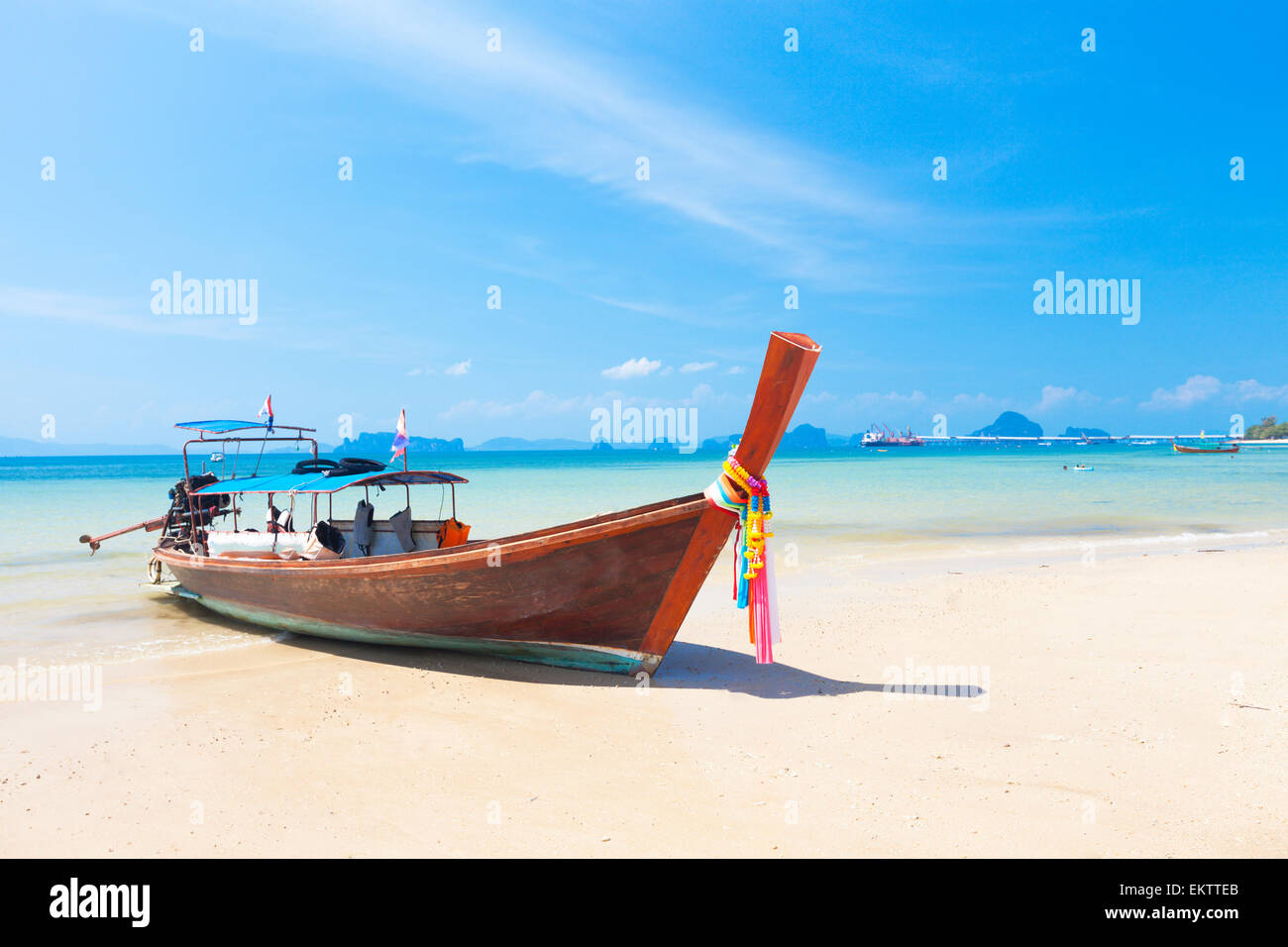Long tail boat on tropical beach, Krabi, Thailand Stock Photo